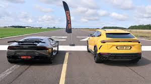 2019 lamborghini urus first drive review: Drag Race Lamborghini Urus Vs Huracan Youtube