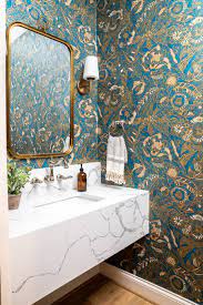 I like this powder room. Powder Room Renovation With A Floating Vanity And Statement Wallpaper