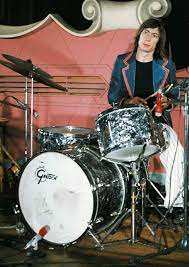 Some say he does it because it ensures that there's no high hat bleed from a concurrent hit entering the snare mic at the time as he hits the snareothers . Charlie 1972 I Love A Low Positioned Rack Tom Tilted In On A Snare Stand Like Charlie Shows Here It S A Rolling Stones Charlie Watts Like A Rolling Stone