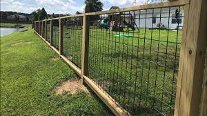 What makes a hog wire fence? Diy Hogwire Panel Fence Using Dado Groove On A Sloped Yard Youtube