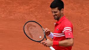 Novak djokovic of serbia celebrates after beating stefanos tsitsipas of greece in the men's singles final at the 2021 french open tennis tournament sunday at roland garros in paris. Djokovic Marches Into Fourth Round To Face Teen Musetti In French Open