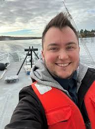 Robin Mueller (they/them)