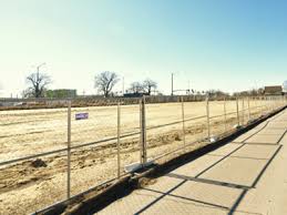 Sandstone picket 7/8 x 3 x 16'. Sioux Falls Temporary Fence Rental Installation Purchasing American Fence Rental Company