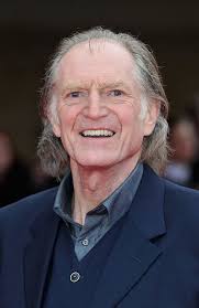 Argus Filch is the caretaker at Hogwarts. He has a pet cat called Mrs.  Norris who is usually