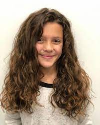 Dark long curly hairstyles are excellent for longevity between haircuts. 19 Cutest Hairstyles For Curly Hair Girls Little Girls Toddlers Kids Curly Girl Hairstyles Curly Hair Styles Naturally Curly Hair Styles