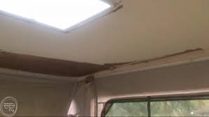 We will clean roof after roof is clean from loose debris we will seal all pipes outlets skylights with a white this system protects your roof from the elements while significantly reduces heat inside rv and trailer. Pop Up Camper Remodel Giving The Ceiling A Facelift Refresh Living
