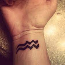 The Water Bearer Sign Aquarius Tattoo Aquarius Tattoos Aquarius Tattoo Ideas