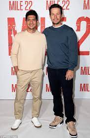Iko uwais was born in jakarta, indonesia. Mark Wahlberg Exudes Casual Cool In Grey Sweater And Black Slacks To Promote New Thriller Mile 22 Daily Mail Online