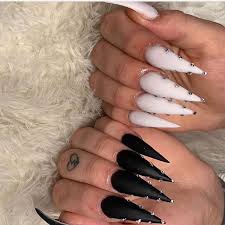 The stiletto nails come to a distinct point at the top and could poke an eye out if they needed to. Alexismpins Acrylic Nails Stiletto White Stiletto Nails Black Stiletto Nails
