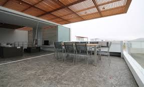 > departamentos terraza casa madera. Casa De Playa Con Piso De Piedra Concreto Estampado En Peru