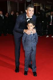 We use cookies to improve your experience on our site and to show you relevant advertising. Cristiano Ronaldo Proudly Shows Off His Mini Me Son At Documentary Film Premiere Mirror Online