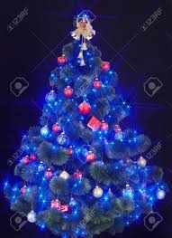 We did not find results for: Christmas Tree With Light And Blue Star Black Background Stock Photo Picture And Royalty Free Image Image 8122546