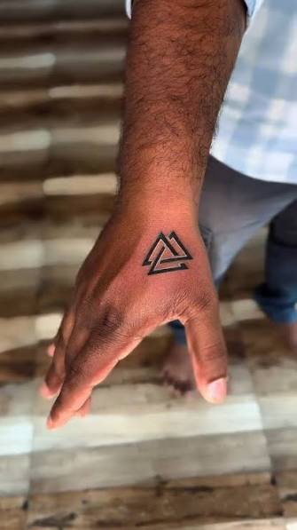 Infinite strength in three lines. ♾️, #infinitytattoo #triangletattoo #tattookerala #keralatattooartist #trendingpost