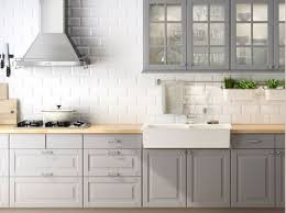 Light Grey Kitchen Cabinets With Amazing White Brick Wall Background Concept Combination With Wooden Kitchen Design Kitchen Inspirations Grey Kitchen Cabinets