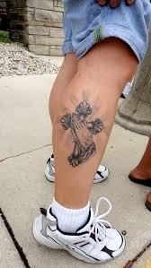 Floral motifs never go out of style. 25 Amazing Cross Calf Tattoos