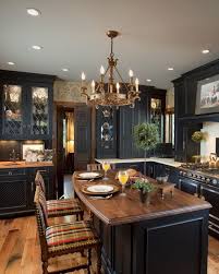 Black Distressed Cabinets A Few Lightened With Custom Leaded Glass Panels Provide A Gorgeo Traditional Kitchen Design Kitchen Design Trends Victorian Kitchen