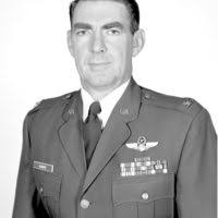 Col. David Francavilla (center) receives retirement