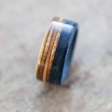 These Are Handmade Wooden Wedding Rings Made Out Of Broken Skateboards As A Skateboard It Contai Skateboard Rings Wooden Rings Engagement Wooden Wedding Ring