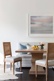 A simple vintage farmhouse kitchen bench of solid wood stained in with its spindle back, this kitchen chair embodies the charm and warmth of the traditional furniture. Brown Cane Chairs At Square Oak Dining Table Transitional Dining Room