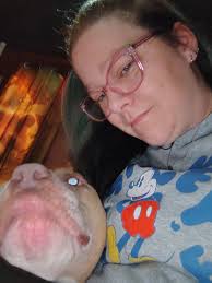 Dog's family helping with weight and clothes