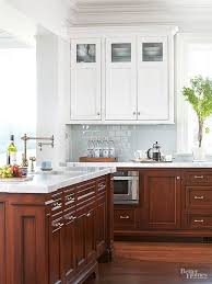 Here, floating wood shelves and a custom wood range hood detail do the job. 5 Fresh Looks For Natural Wood Kitchen Cabinets