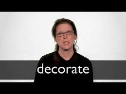 Verb decorate if someone is decorated, they are given a medal or other honour as an official reward for something that they have done. Decorate Definition And Meaning Collins English Dictionary