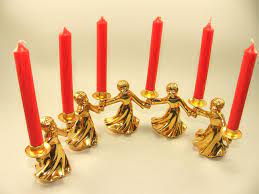 You can also choose from candelabras with various amounts of holders, so you can light multiple taper candles at once. Mid Century Vintage Bmf Gold Plated Candle Holders Angels Christmas Candlesticks Nagel Quist Era Christmas Candlesticks Vintage Candles Candles
