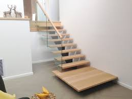 But we also build modern floating stair systems with solid douglas fir treads mounted on a center steel or wood stringer with aluminum railing systems. Our Most Popular Modern Look Staircase Coastal Staircases Coastal Staircases