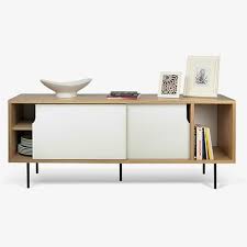 Ein modell in mattem weiß mit holzfarbenen füßen bringt unkonventionelle eleganz in ihr zuhause. Monoqi Dann Sideboard White Dining Room Furniture Furniture Modern Sideboard