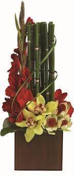 Choose an artificial plant with artificial flower that will bring you greenery throughout the year. Send Floral Arrangements New Zealand Wide Tropical Flower Arrangements Modern Flower Arrangements Corporate Flowers