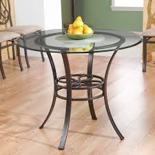 Thick flat polish tempered glass table top gives you a sleek, subdued centerpiece for your dining room, conference room, or living room. Round Glass Top Dining Table With Durable Metal Base Fastfurnishings Com