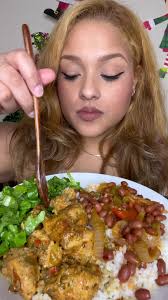 Eating Rice and Beans Chicken and Sauce and Potato Salad