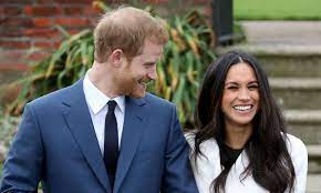 The newly married britain's prince harry, duke of sussex, (r) and meghan markle, duchess of sussex. The Sweet Moment Prince Harry Was Caught Looking Lovingly At Meghan Markle S Baby Bump Hello