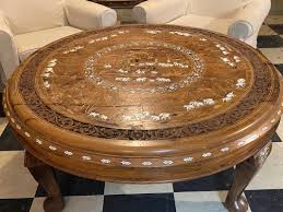 The base has fourteen legs separated by architecturally intriguing arches with carved honeycomb panels. Coffee Tea Tables Dining Tables Game Tables Ornate Mirrors Cabinets Curios Etageres Pedestals Planters Plant Stands Wine Tea Service Cart Fireplace Screens Bamboo Rattan Items Etc