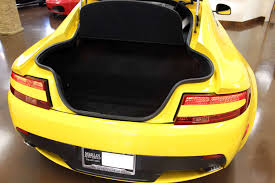 Image result for Sunburst Yellow 2012 Aston Martin