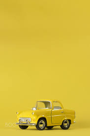 Yellow Toy Car Yellow Toy Car On A Yellow Background In 2020 Yellow Background Yellow Wallpaper Tumblr Yellow