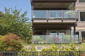 See more ideas about glass balcony, glass balcony railing, house design. Glass Railings Mean More Light For Your Summer Plants Flowers