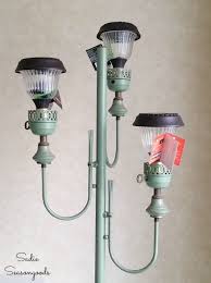 Backyard Decor With An Antique Floor Lamp And Small Solar Lights Antique Floor Lamps Small Solar Lights Solar Lamps Diy