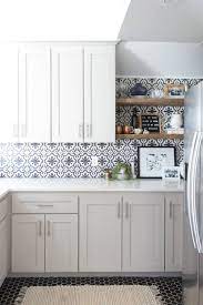 15 White Kitchen Cabinet Ideas To Brighten Up Your Kitchen Space Patterned Tile Backsplash Kitchen Tiles Backsplash Kitchen Renovation