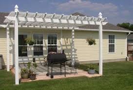 The patio area to be covered is fairly large, 24'x12', so spanning it became the major obstacle. How To Build A Free Standing Patio Cover Ehow Free Standing Pergola Pergola Diy Pergola