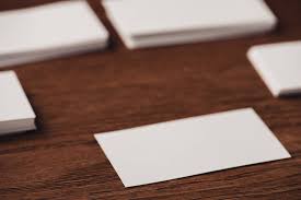 Stack of blank business card. Selective Focus Of White Blank Business Cards On Brown Wooden Surface Free Stock Photo And Image
