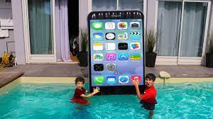 Set includes frame, liner with drain plug, and repair kit with patches. Big Iphone In Swimming Pool Youtube