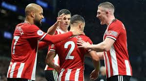I think var being used for mm reviewing is stupid but there's a difference between you vs. Tottenham 1 1 Sheffield United George Baldock Salvages Point For Blades Bbc Sport