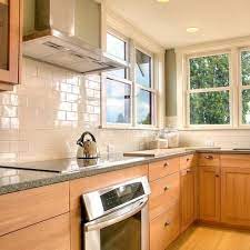 A neutral colored tile floor is an ideal pairing for light maple kitchen cabinets. Light Maple Cabinets Design Ideas Pictures Remodel And Decor Maple Kitchen Cabinets Kitchen Renovation Country Kitchen Tiles