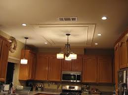 The Kim Six Fix How To Shave 30 Years Off Your Kitchen Kitchen Lighting Recessed Lighting Kitchen Lighting Fixtures