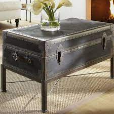 The ludlow coffee table is made from natural pippy oak.the collection has elegant beaded panels and tapered. Ludlow Trunk Coffee Table From Pottery Barn House Decor