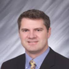 Dr. Adrian Woolley, DO