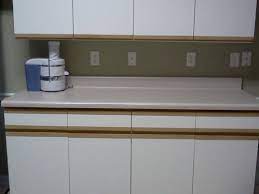 And, yes, susan tells us painting the melamine worked — the brush strokes even look like wood grain, she says. My 1980 Kitchen Cabinets