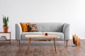 You could leave the lamp where it is right now and the put the leather sit on the other. How To Decorate A Coffee Table