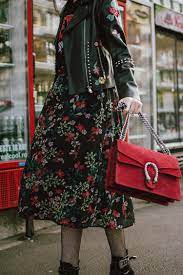 How To Mix Floral Prints Biker Jacket And Midi Dress Couturezilla Winter Dress Outfits Floral Dress Black Fish Net Tights Outfit